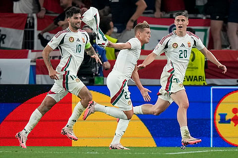 Kevin Csoboth celebrates after scoring the opening goal against Scotland